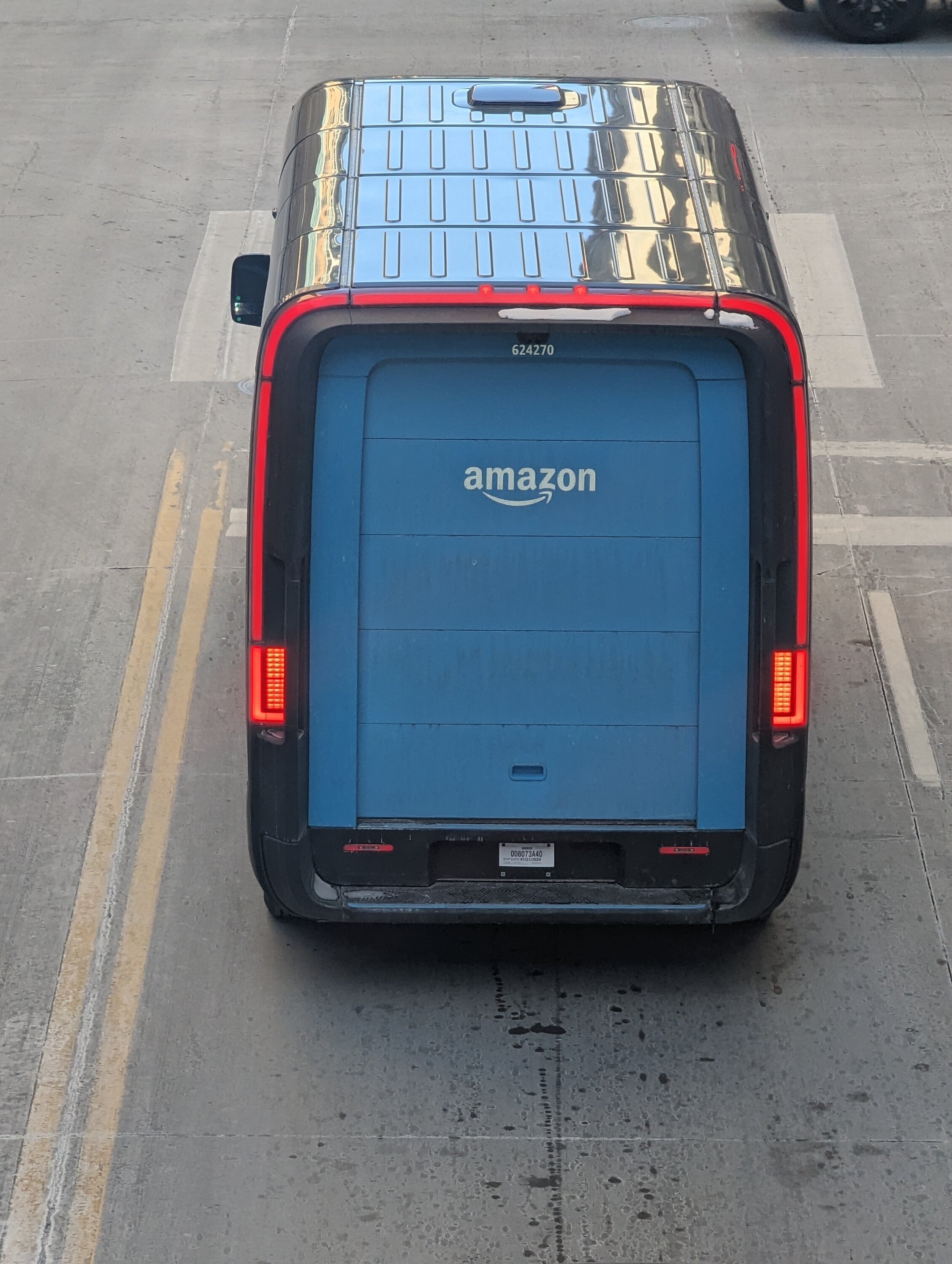 Rivian R1T R1S Amazon now has 10,000 Rivian electric vans in its delivery fleet 1000000959