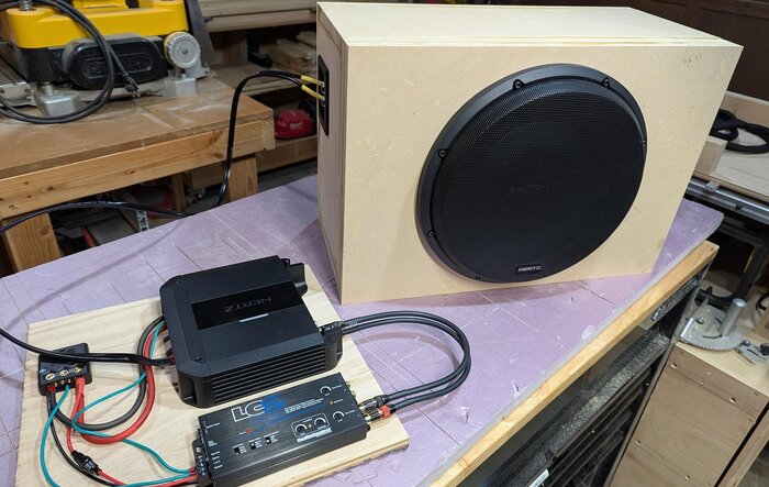 Gen 1 R1T aftermarket subwoofer box install in gear tunnel