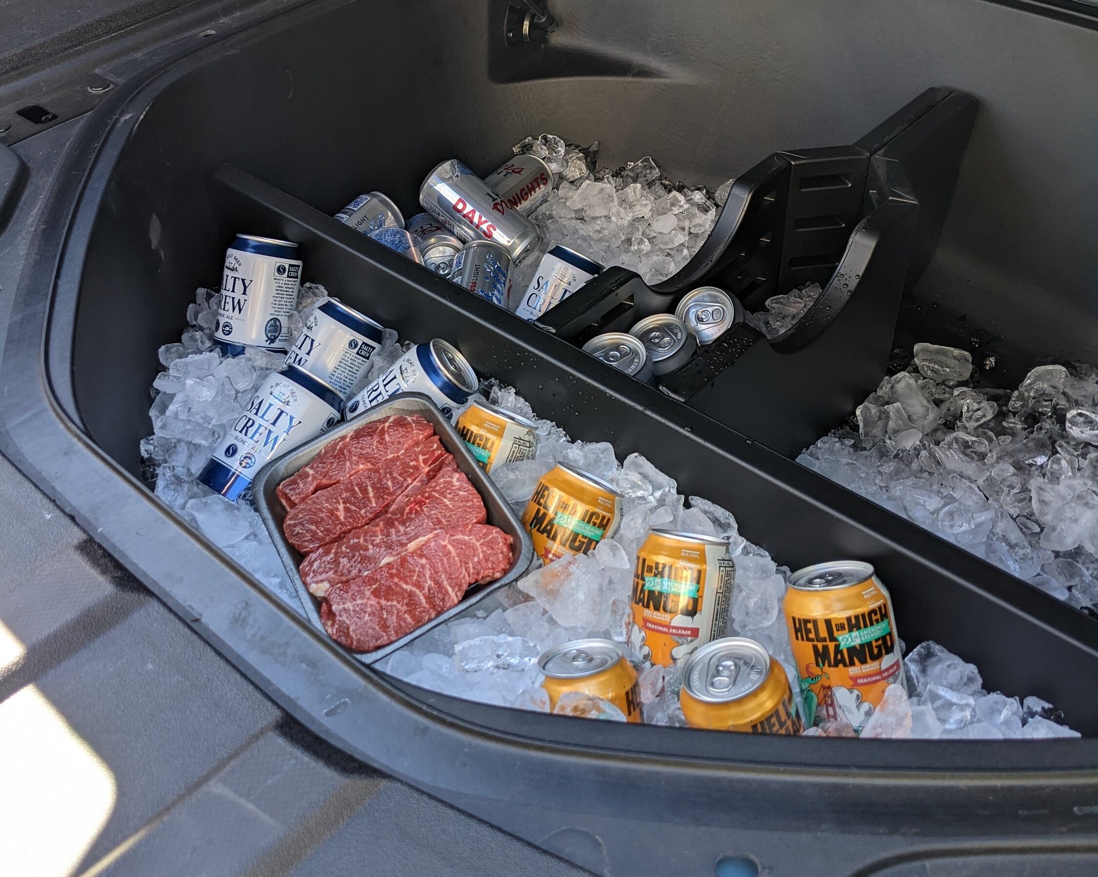 Impressed with R1T spare tire well as a cooler! Rivian Forum R1T