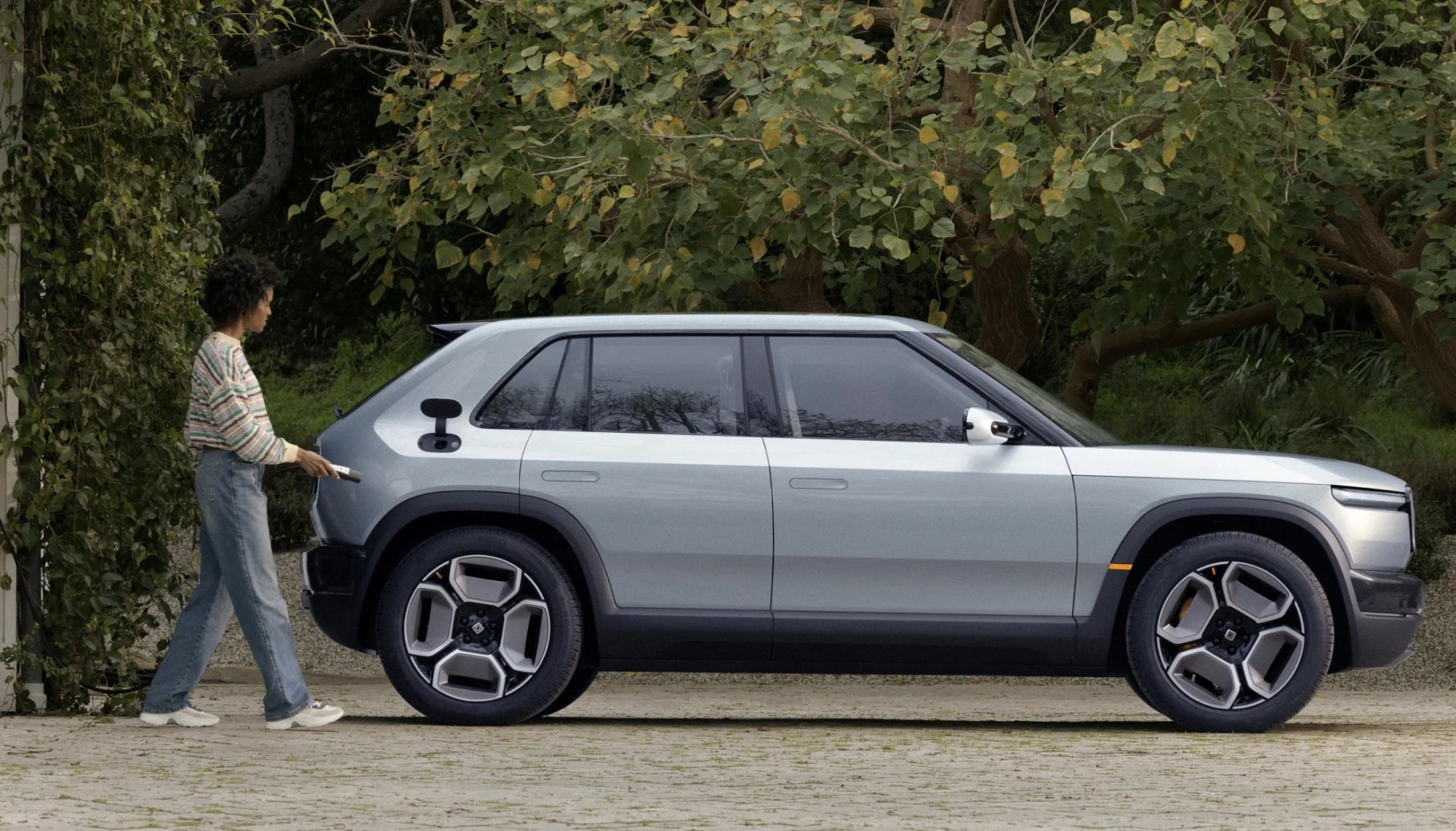 Tesla Engineer Urges Rivian To Move Charge Port Location On R2 R3 R3X tesla-engineer-urges-rivian-to-move-charge-port-location-on-r2-r3-r3x